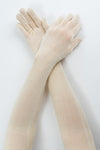 Delp Stockings Extra Long Ladies Silk Gloves. Cream color view on model. 
