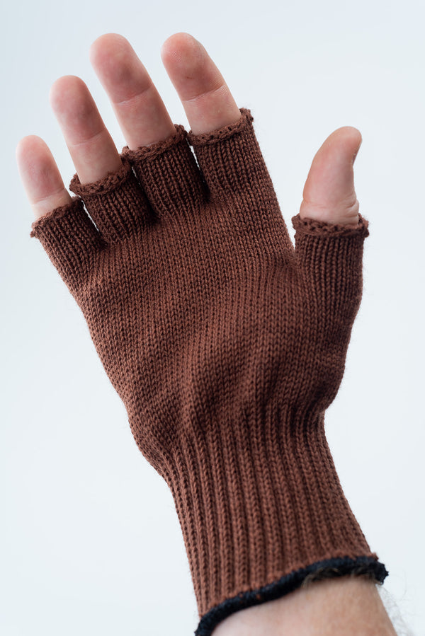 Delp Stockings, Wool Fingerless Gloves. Brown color on model, palm side view.