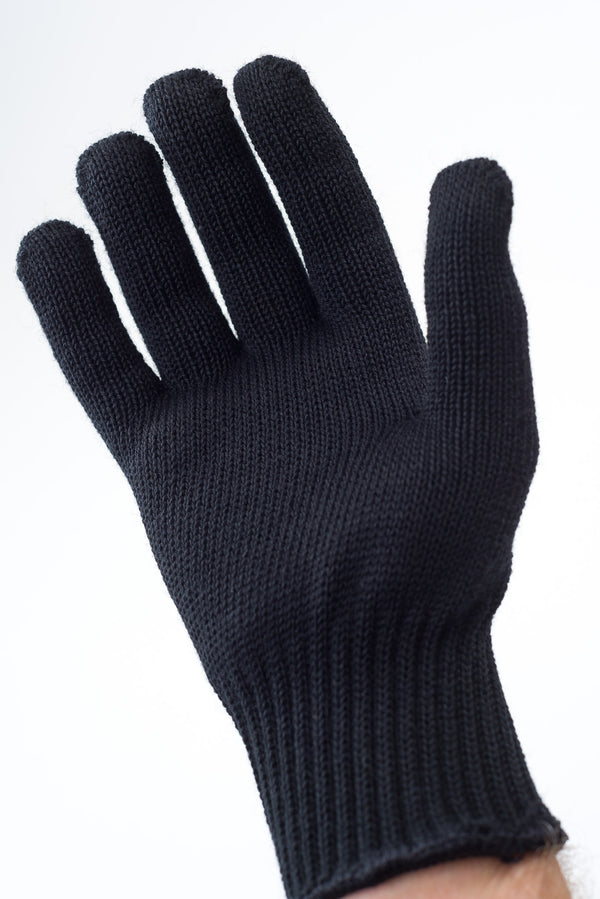 Delp Stockings, Wool Gloves. Black color on model, palm side view.